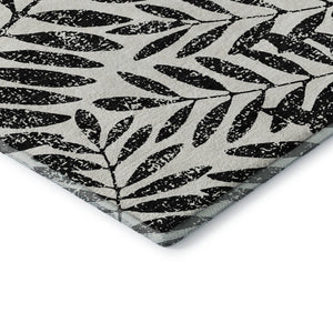 HomeRoots 8' Black and Beige Floral Washable Round Rug – Stylish, Durable, and UV-Protected for Any Room 671423