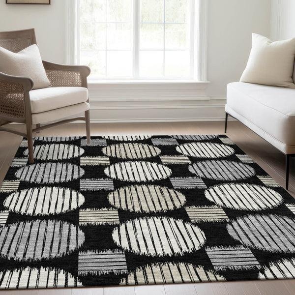 HomeRoots 5' X 8' Stylish Black and Ivory Geometric Area Rug with UV Protection - Washable & Durable Design 671512