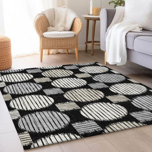 HomeRoots 9' X 12' Black and Ivory Geometric Area Rug - Washable, UV-Protected, Durable for Busy Homes! 671515
