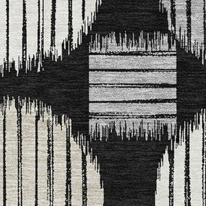 HomeRoots 9' X 12' Black and Ivory Geometric Area Rug - Washable, UV-Protected, Durable for Busy Homes! 671515