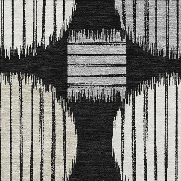 HomeRoots 9' X 12' Black and Ivory Geometric Area Rug - Washable, UV-Protected, Durable for Busy Homes! 671515