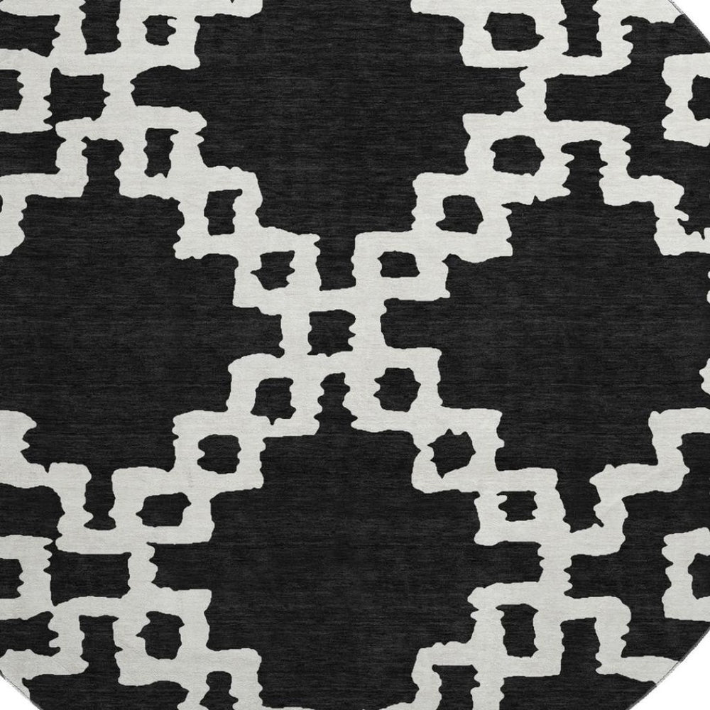 HomeRoots 8' Black and Ivory Abstract Geometric Round Rug – Washable, UV-Protected, Durable for High-Traffic Areas 671687