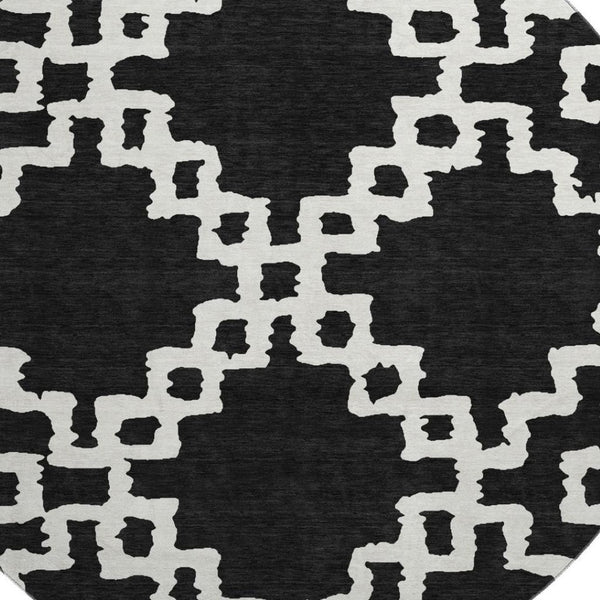 HomeRoots 8' Black and Ivory Abstract Geometric Round Rug – Washable, UV-Protected, Durable for High-Traffic Areas 671687