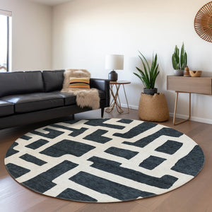 HomeRoots 8' Black And Ivory Abstract Geometric Round Rug - Washable, UV Protected, Durable, Modern Design! 671771