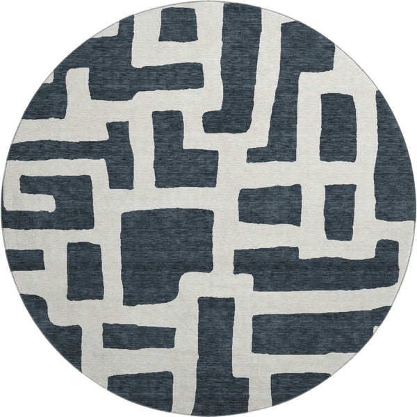 HomeRoots 8' Black And Ivory Abstract Geometric Round Rug - Washable, UV Protected, Durable, Modern Design! 671771