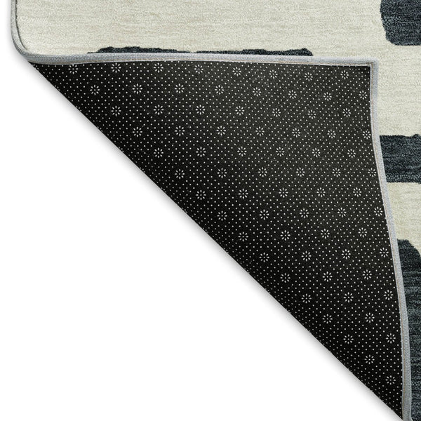 HomeRoots 8' Black And Ivory Abstract Geometric Round Rug - Washable, UV Protected, Durable, Modern Design! 671771