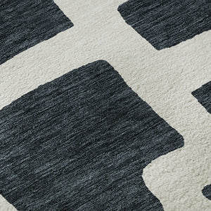 HomeRoots 8' Black And Ivory Abstract Geometric Round Rug - Washable, UV Protected, Durable, Modern Design! 671771