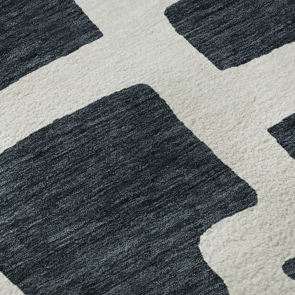 HomeRoots 8' Black And Ivory Abstract Geometric Round Rug - Washable, UV Protected, Durable, Modern Design! 671771