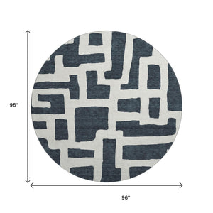 HomeRoots 8' Black And Ivory Abstract Geometric Round Rug - Washable, UV Protected, Durable, Modern Design! 671771