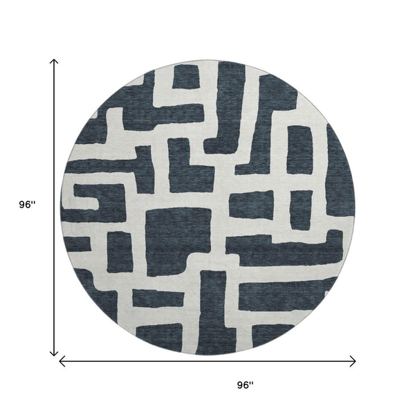 HomeRoots 8' Black And Ivory Abstract Geometric Round Rug - Washable, UV Protected, Durable, Modern Design! 671771