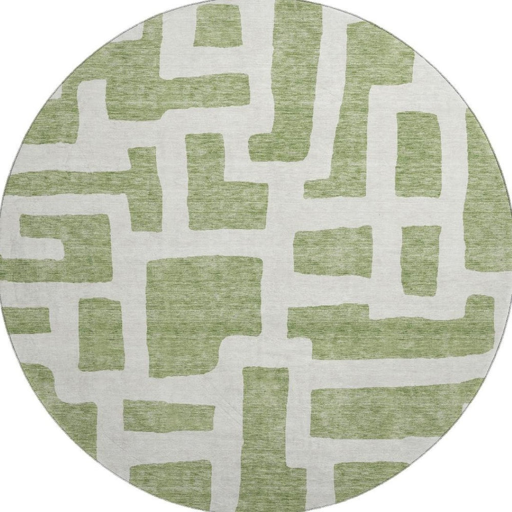 HomeRoots 8' Green and Ivory Abstract Geometric Round Rug - Washable, UV-Protected, Durable & Stylish Décor Piece 671801