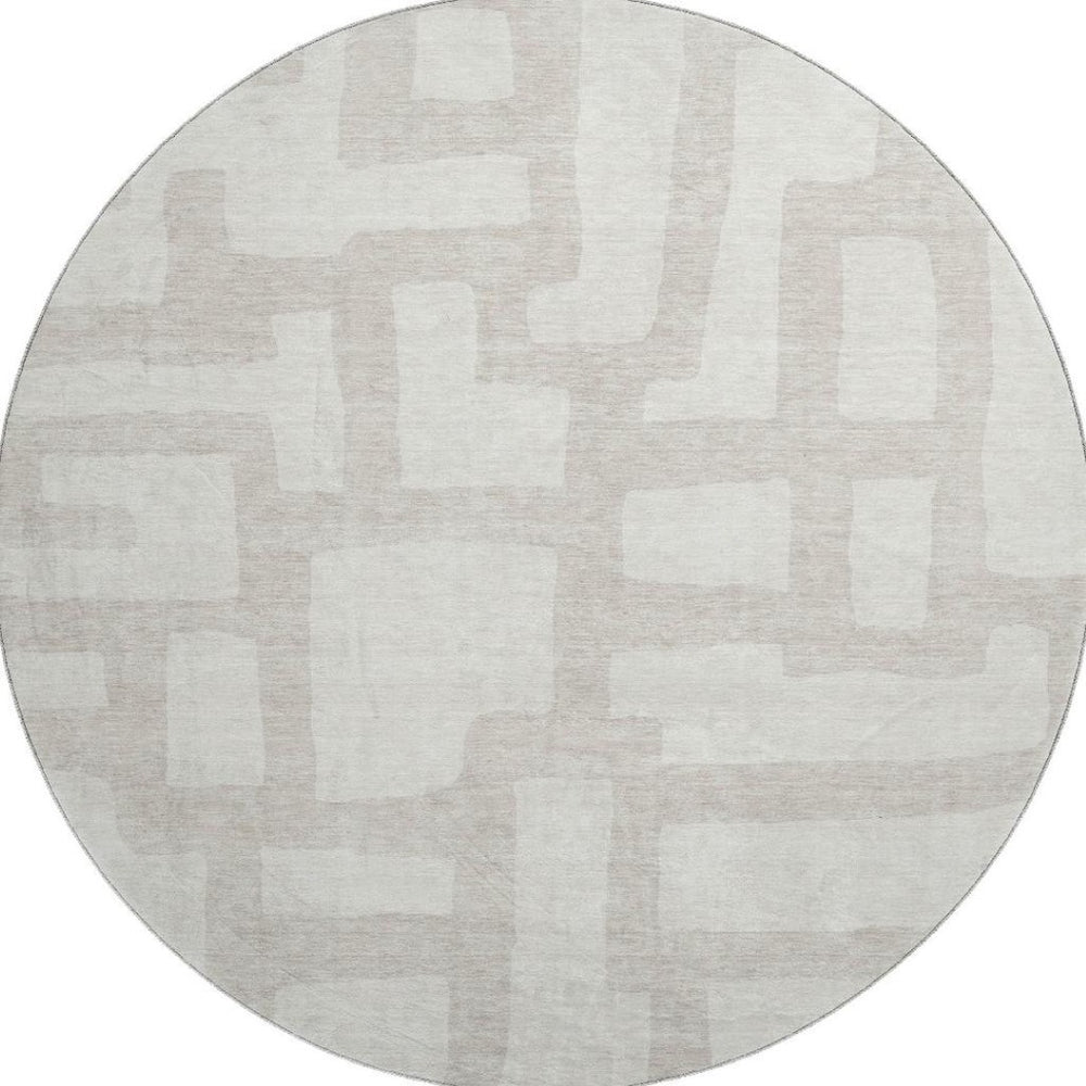 HomeRoots 8' Ivory and Beige Abstract Geometric Round Rug - Washable, UV Protected, Stain Resistant Design 671807