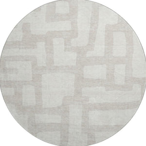HomeRoots 8' Ivory and Beige Abstract Geometric Round Rug - Washable, UV Protected, Stain Resistant Design 671807