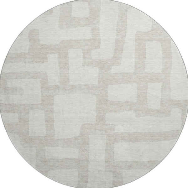 HomeRoots 8' Ivory and Beige Abstract Geometric Round Rug - Washable, UV Protected, Stain Resistant Design 671807