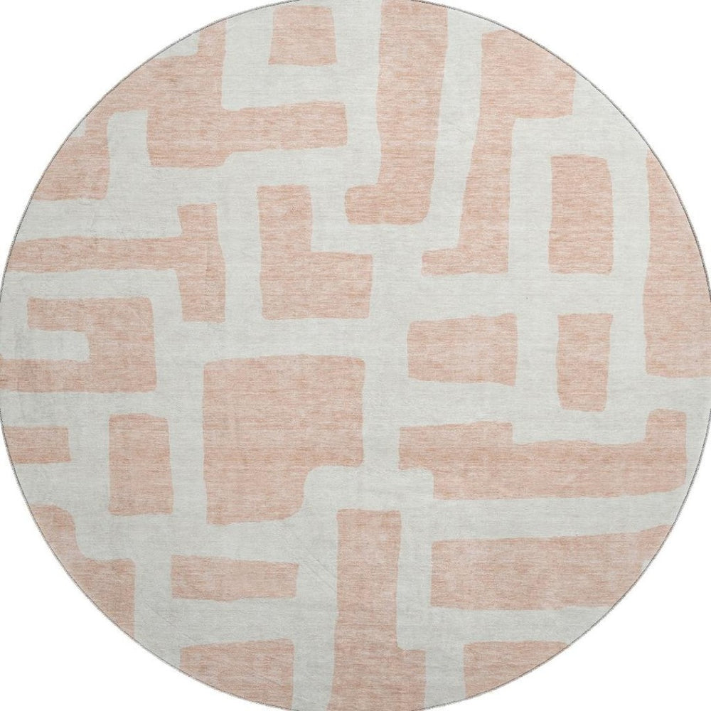 HomeRoots 8' Peach and Ivory Abstract Round Rug - Modern Geometric Design with Stain, UV Protection & Washable Care 671819