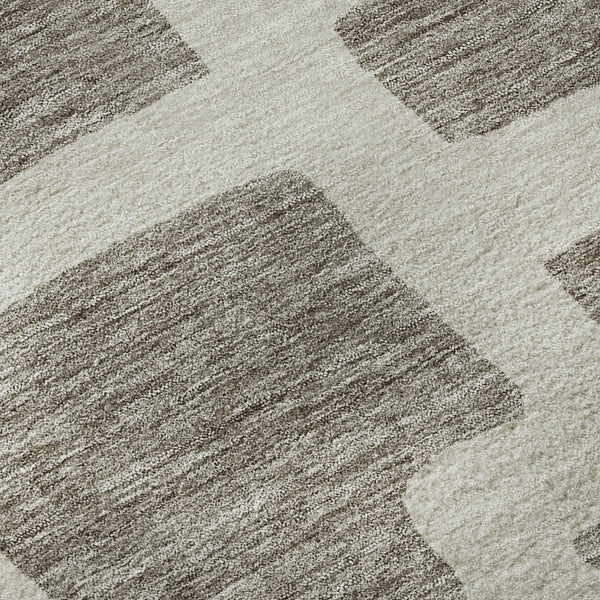 HomeRoots 8' Taupe and Beige Abstract Geometric Round Rug - Washable, UV-Protected, Perfect for High Traffic Areas 671843