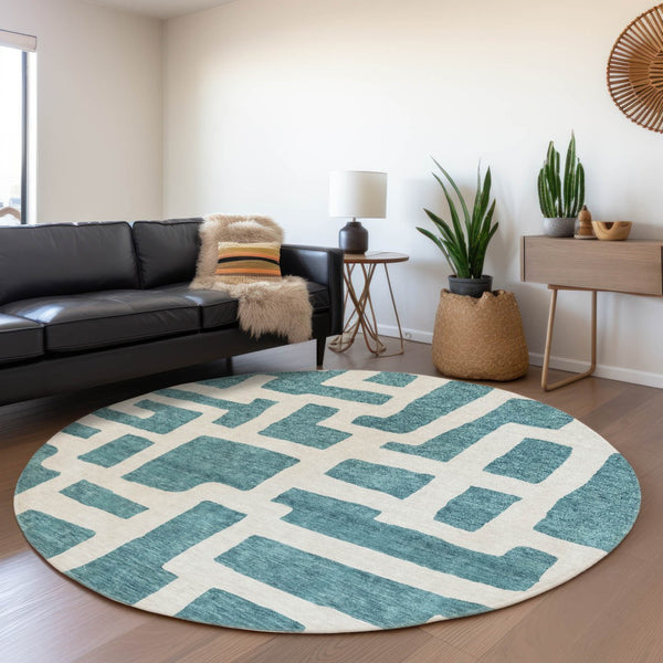 HomeRoots 8' Teal and Ivory Abstract Geometric Round Rug - Durable, Washable, UV-Protected for Modern Spaces 671849