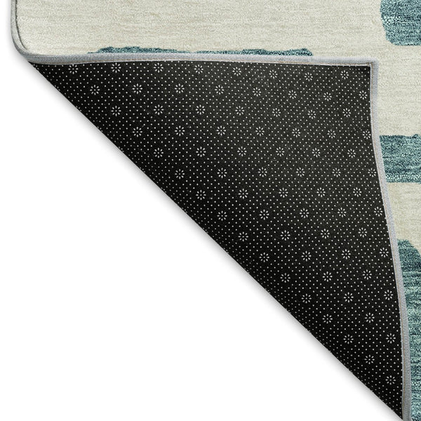 HomeRoots 8' Teal and Ivory Abstract Geometric Round Rug - Durable, Washable, UV-Protected for Modern Spaces 671849