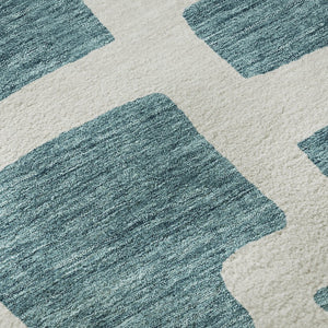 HomeRoots 8' Teal and Ivory Abstract Geometric Round Rug - Durable, Washable, UV-Protected for Modern Spaces 671849