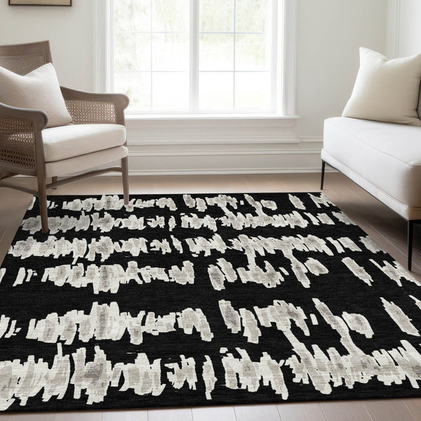 HomeRoots 5' X 8' Black And Ivory Striped Area Rug – Durable, Washable, UV-Protected, Perfect for Any Space! 671944