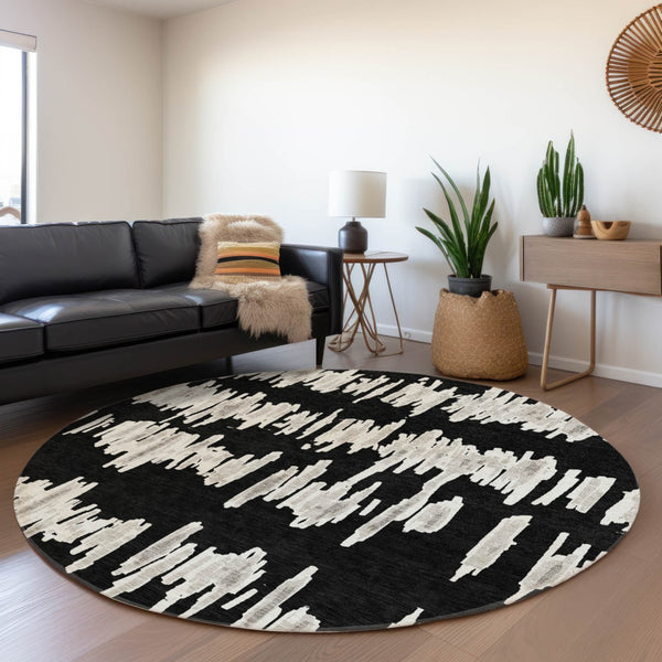 HomeRoots 8' Black And Ivory Striped Washable Round Rug - Durable, UV-Protected, Ideal for High-Traffic Areas 671945