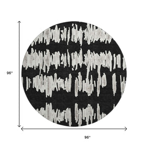 HomeRoots 8' Black And Ivory Striped Washable Round Rug - Durable, UV-Protected, Ideal for High-Traffic Areas 671945
