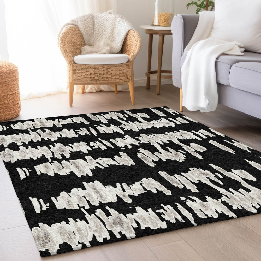 HomeRoots 8' X 10' Black and Ivory Striped Area Rug – Washable, UV-Protected, Durable for High-Traffic Spaces 671946