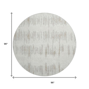 HomeRoots 8' Stylish Ivory and Beige Striped Washable Round Rug with UV Protection for Family Spaces 671975