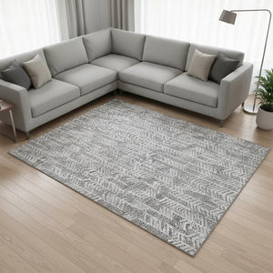 HomeRoots 8' X 10' Gray and Ivory Tribal Area Rug - Durable, Washable, UV-Protected for High-Traffic Spaces 672048