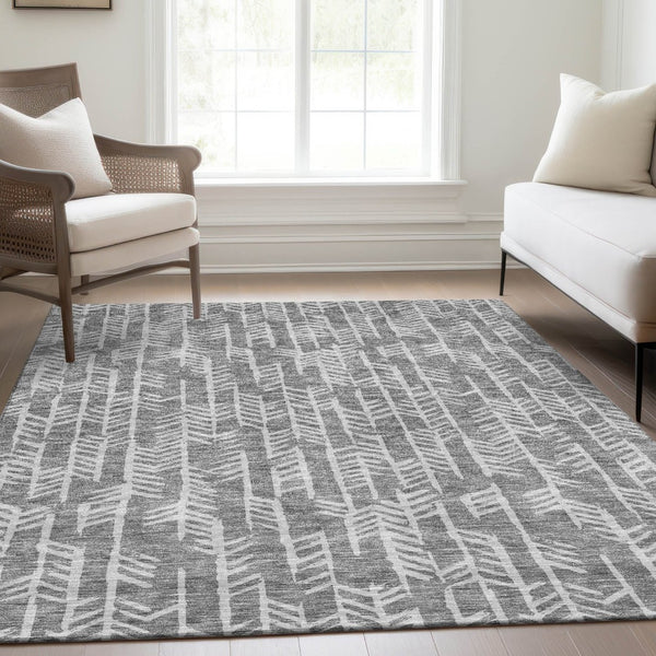 HomeRoots 8' X 10' Gray and Ivory Tribal Area Rug - Durable, Washable, UV-Protected for High-Traffic Spaces 672048