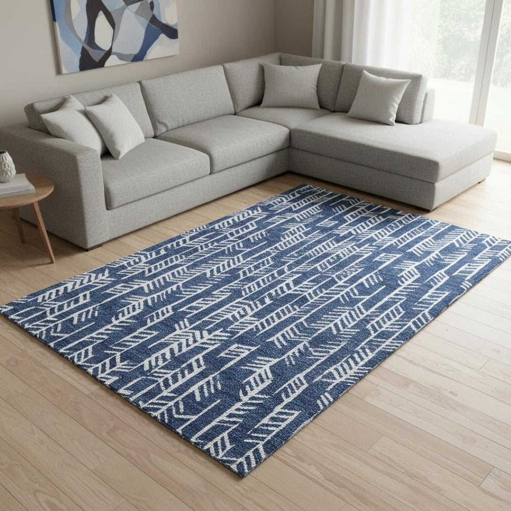 HomeRoots 10' Navy Blue and Ivory Tribal Area Rug - Washable, UV Protected, Durable Design for Family Spaces 672074