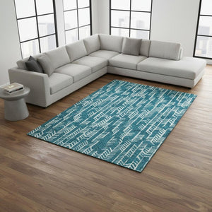 HomeRoots 8' X 10' Teal and Ivory Tribal Area Rug - Washable, UV Protected, Stylish for Homes with Kids & Pets 672090