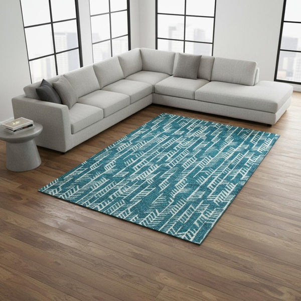 HomeRoots 8' X 10' Teal and Ivory Tribal Area Rug - Washable, UV Protected, Stylish for Homes with Kids & Pets 672090