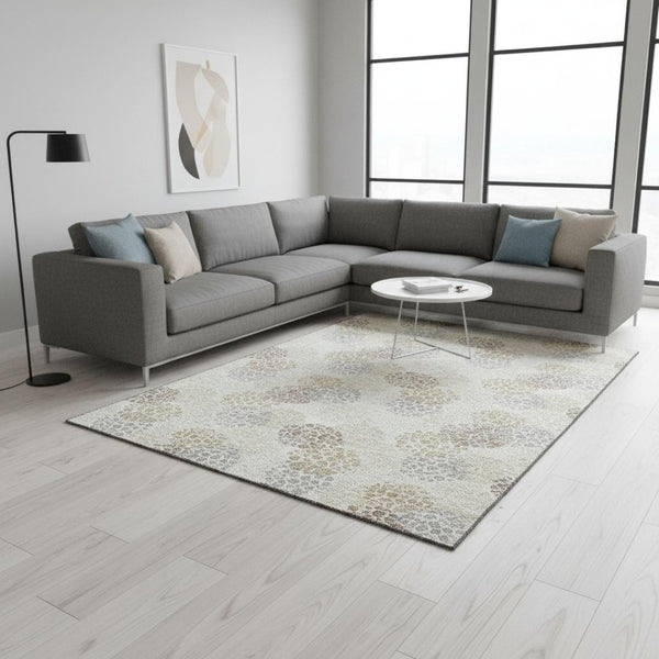HomeRoots 9' X 12' Ivory Taupe Polka Dot Washable Area Rug with UV Protection for Stylish, High-Traffic Spaces 672205