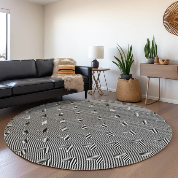 HomeRoots 8' Black And Ivory Abstract Geometric Washable Round Rug - Durable, UV-Protected Accent for Every Home 672311