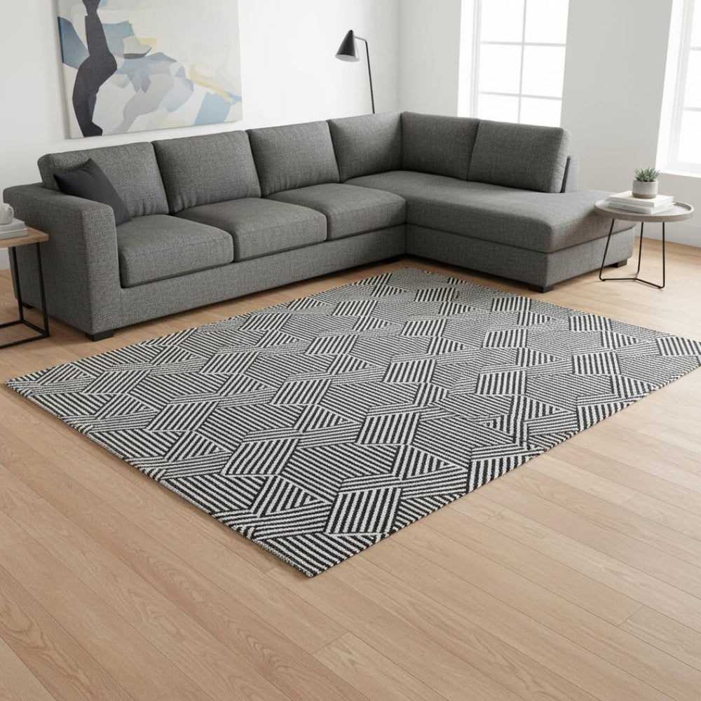 HomeRoots 9' X 12' Modern Black and Ivory Geometric Washable Area Rug with UV Protection for High-Traffic Areas 672313
