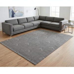 HomeRoots 10' X 14' Stylish Black & Ivory Abstract Geometric Washable Area Rug with Durable UV Protection 672314