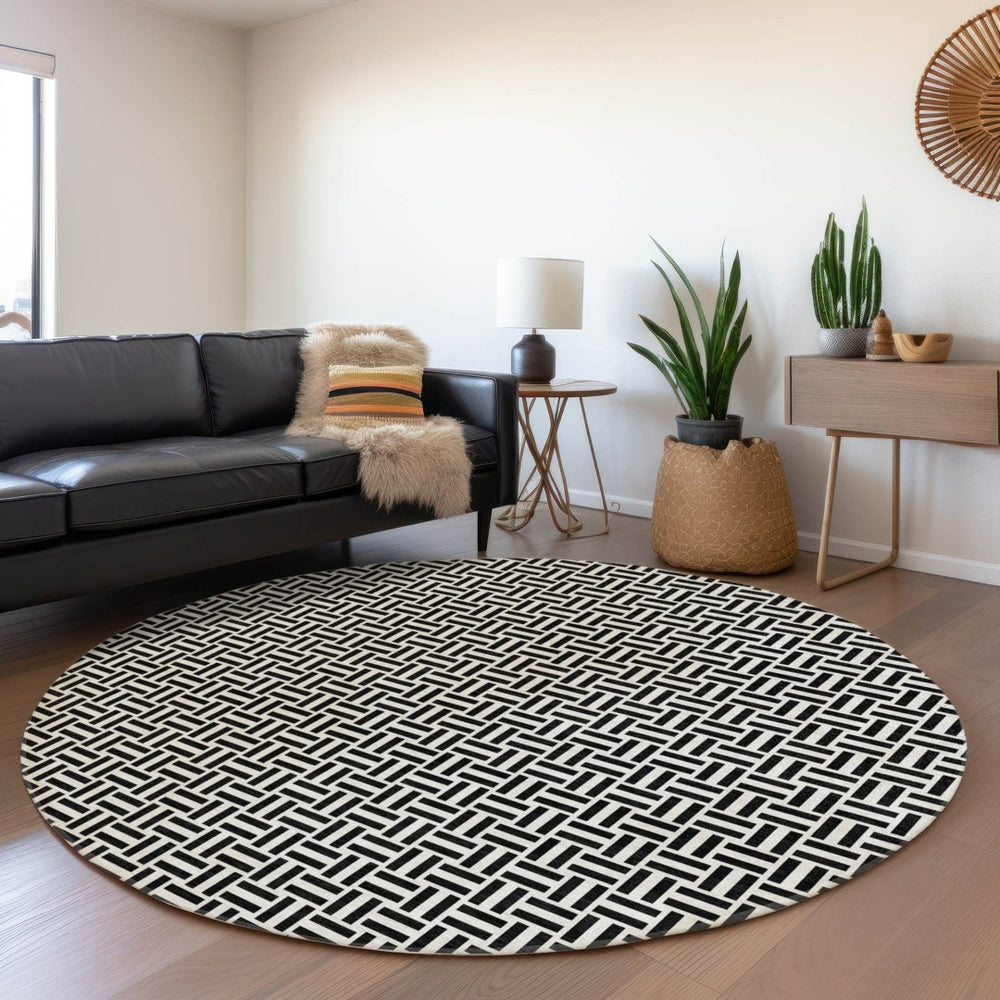 HomeRoots 8' Black And Ivory Geometric Washable Round Rug – Durable, Stylish, UV-Protected for Every Space 672389