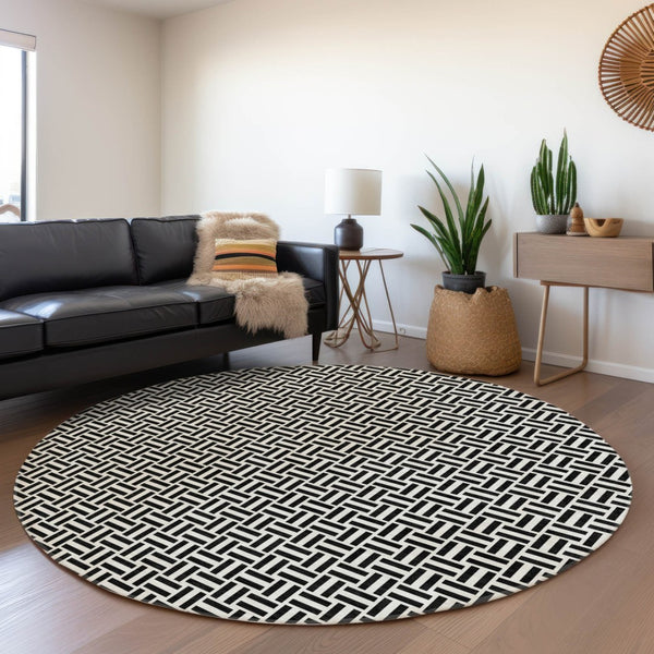 HomeRoots 8' Black And Ivory Geometric Washable Round Rug – Durable, Stylish, UV-Protected for Every Space 672389