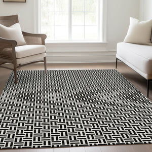 HomeRoots 8' X 10' Black And Ivory Geometric Area Rug - Washable, UV Protected, Durable for High-Traffic Areas 672390