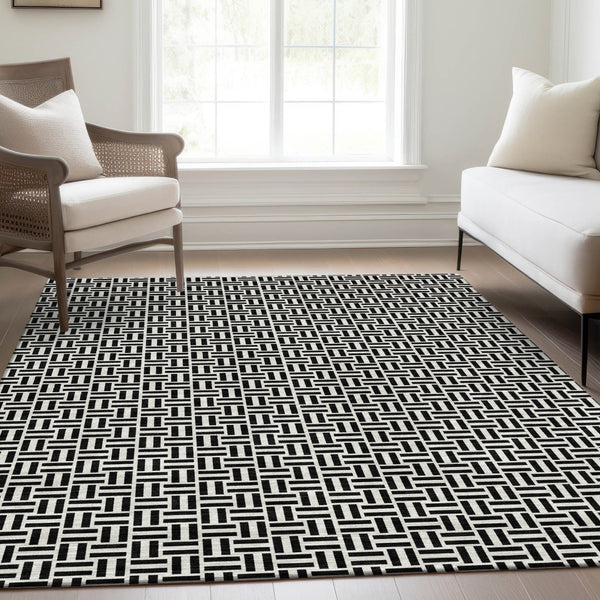 HomeRoots 8' X 10' Black And Ivory Geometric Area Rug - Washable, UV Protected, Durable for High-Traffic Areas 672390