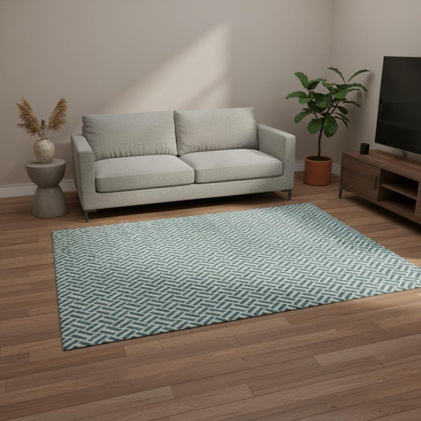 HomeRoots 5' X 8' Stylish Teal and Ivory Geometric Area Rug – Washable, UV Protected for High-Traffic Spaces! 672460