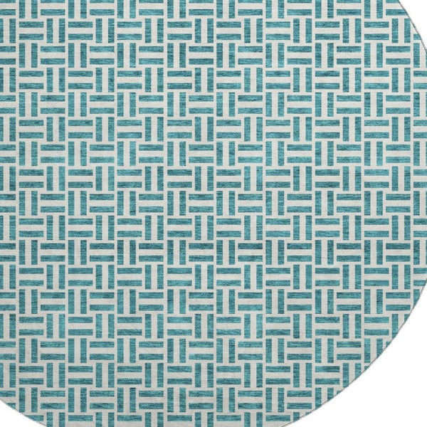 HomeRoots 8' Teal and Ivory Geometric Round Rug - Washable, UV-Protected, Perfect for Active Homes & Spaces! 672461