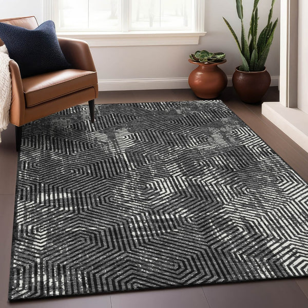 HomeRoots 5' X 8' Black And Ivory Geometric Area Rug – Durable, Washable, UV Protection for Modern Homes 672466