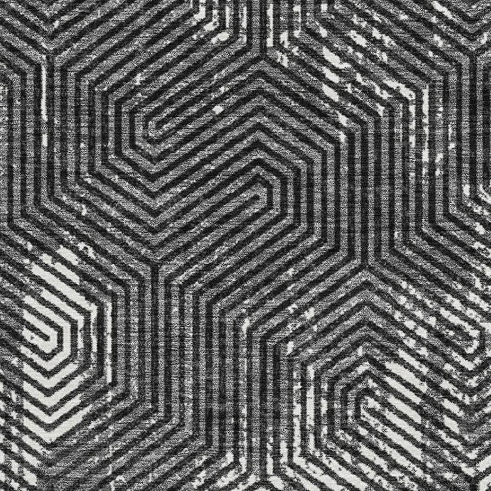 HomeRoots 8' X 10' Black And Ivory Geometric Area Rug - Washable, UV Protected, Perfect for Busy Homes! 672468