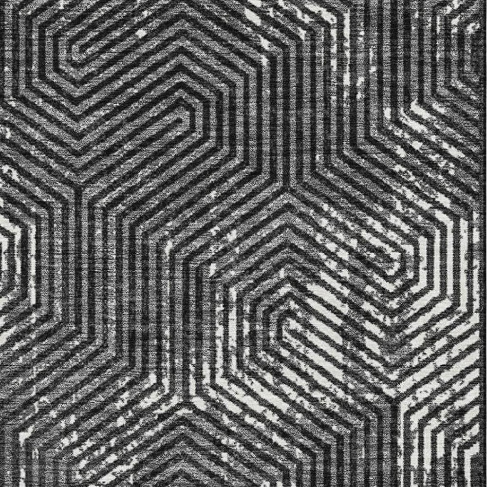 HomeRoots 10' X 14' Geometric Black and Ivory Washable Area Rug with UV Protection for Modern Living Spaces 672470