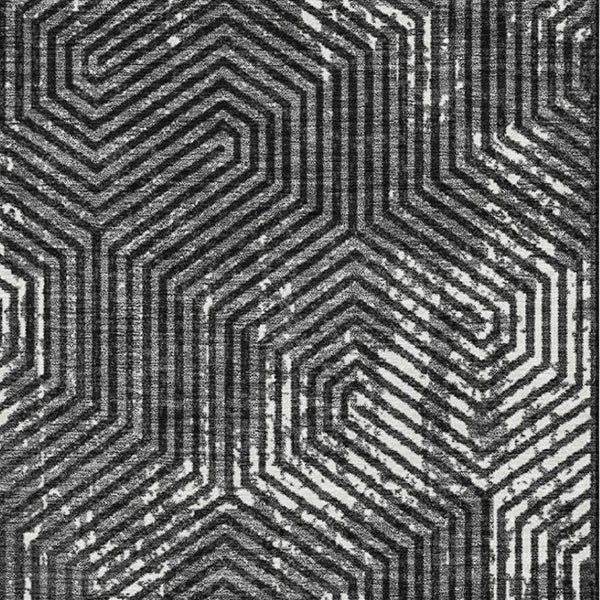 HomeRoots 10' X 14' Geometric Black and Ivory Washable Area Rug with UV Protection for Modern Living Spaces 672470