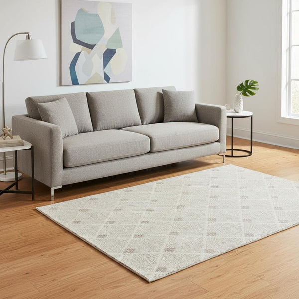 HomeRoots 5' X 8' Beige And Tan Abstract Geometric Washable Area Rug - Stain Resistant & UV Protected Design 672655