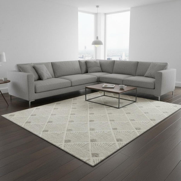 HomeRoots 8' X 10' Beige and Tan Abstract Area Rug with UV Protection - Durable, Washable, and Stylish Focal Point 672657