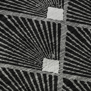 HomeRoots 8' Black and Ivory Abstract Geometric Round Rug - Washable, UV Protected, Durable for High-Traffic Areas 672662